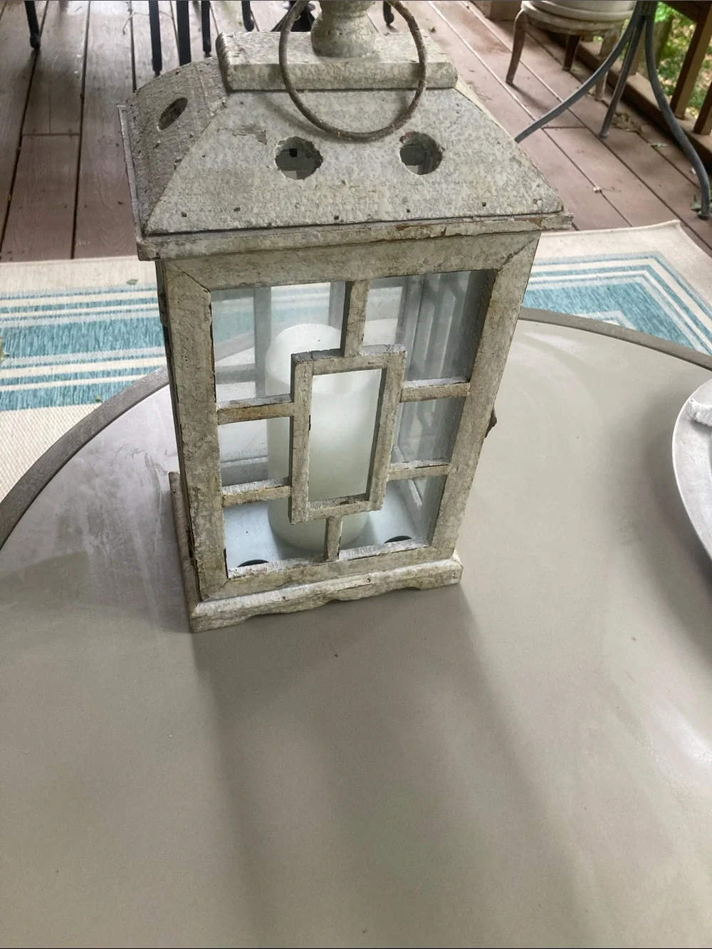 Wood and glass paned porch lantern with battery operated wax candle